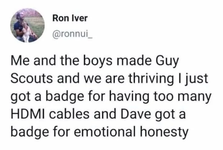 Tweet joking about forming "Guy Scouts" with badges for having too many HDMI cables and emotional honesty