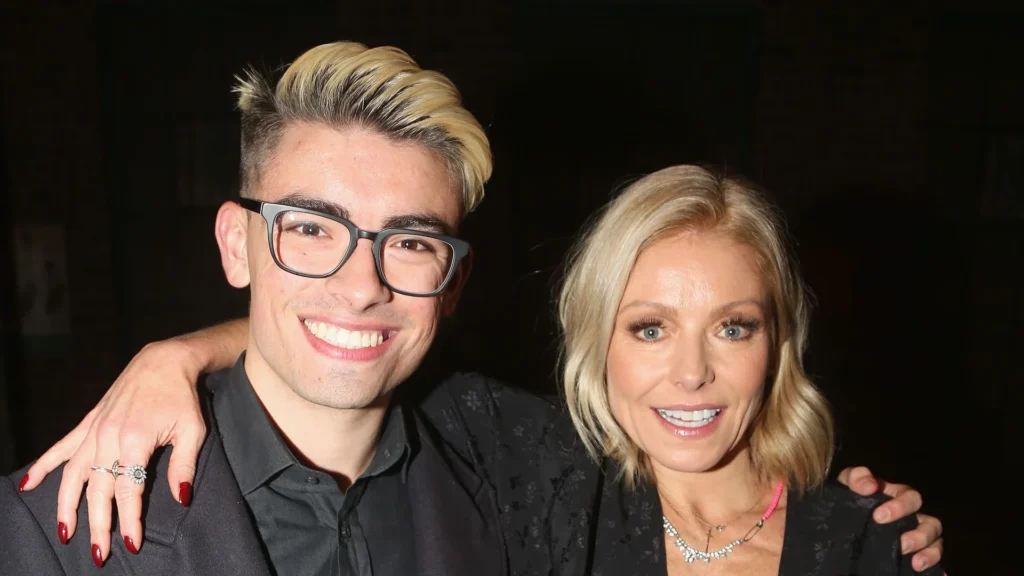 3250983d372b new york ny michael consuelos and kelly ripa pose backstage as jake shears of th