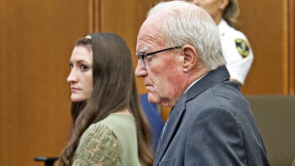 Lindsay Clancy sits next to attorney Kevin Reddington in court