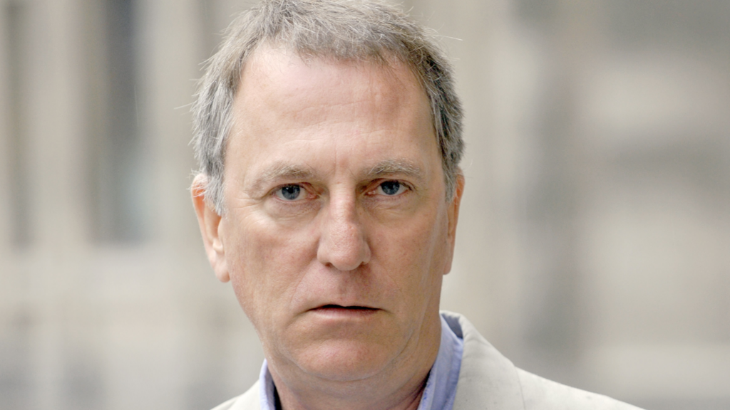 Mark Doyle's face, looking to the camera