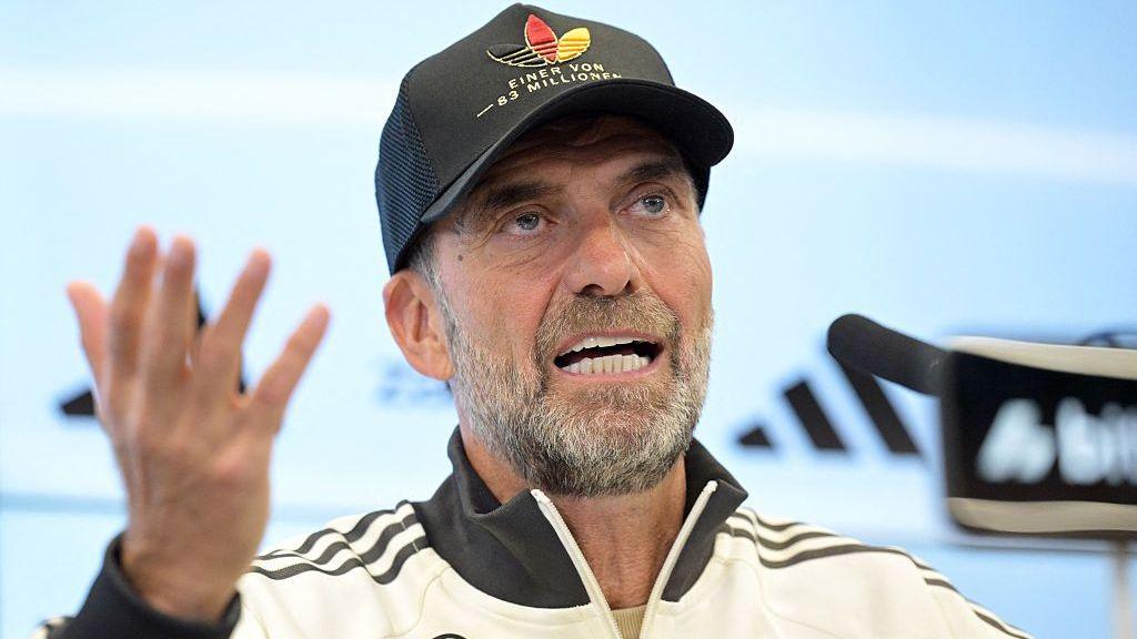 Germany coach Jurgen Klopp gestures while speaking at a news conference on 17 September 2026