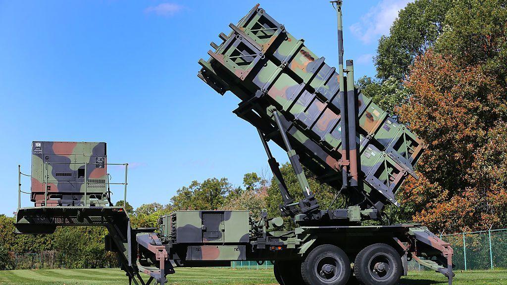 Patriot missile launchers on a grass field in Massachusetts.