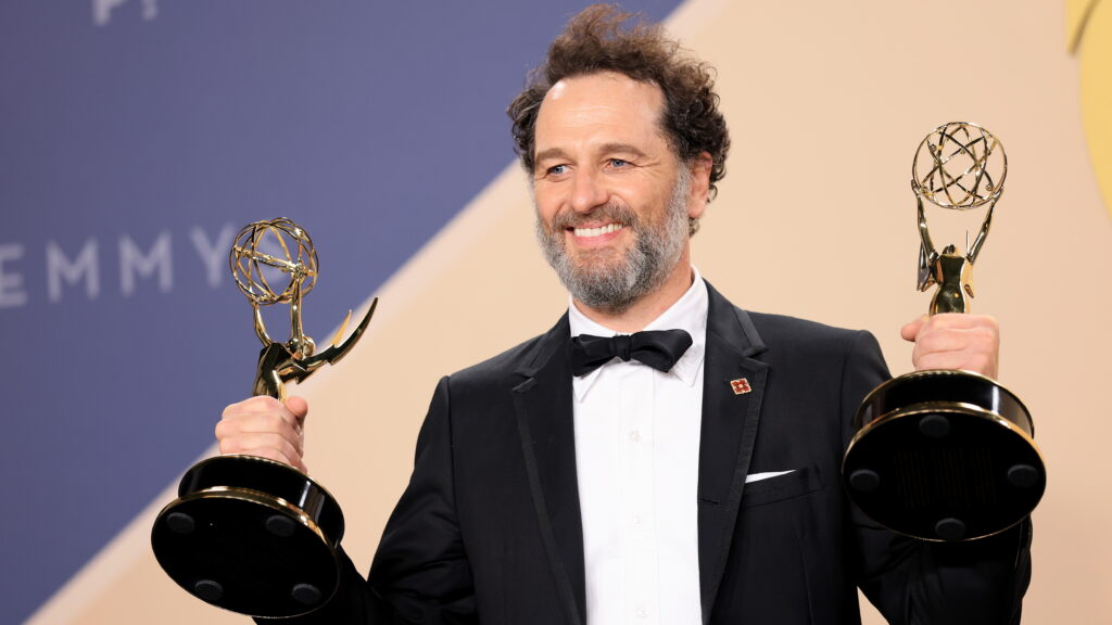 Matthew Rhys shows off his two lead actor awards on Monday night — for his performances in Widow