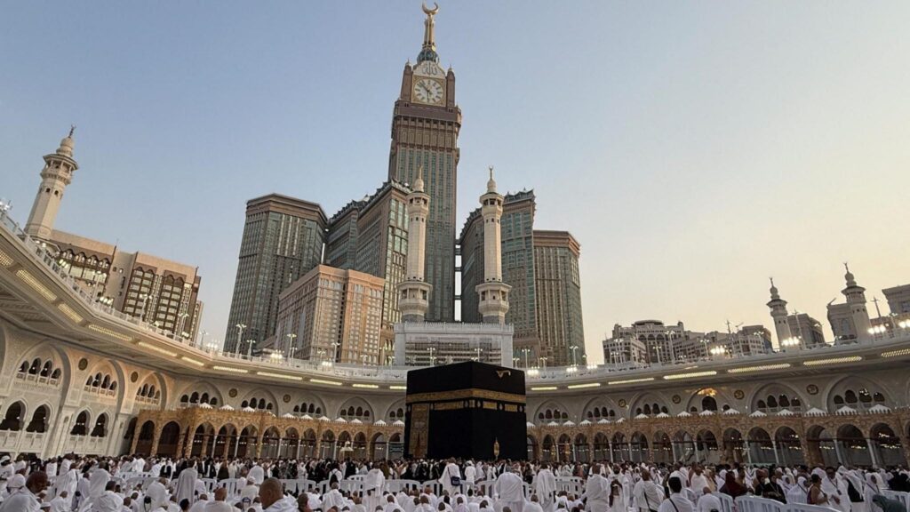 Muslims stand beside the Kaaba at the Grand Mosque in the holy city of Mecca, Saudi Arabia (14 September 2026)