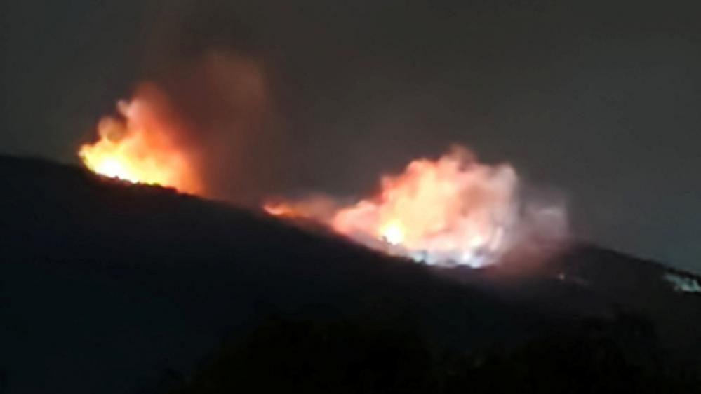 Fire and smoke rise at an ammunition storage facility near Gorni Varpishta, central Bulgaria. Photo: 12 September 2026.