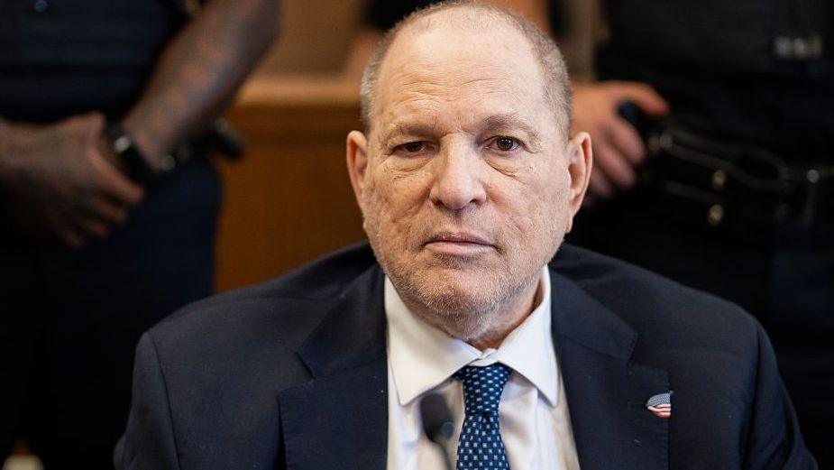 Harvey Weinstein in court in 2026. Hewears a suit with a blue spotted tie.