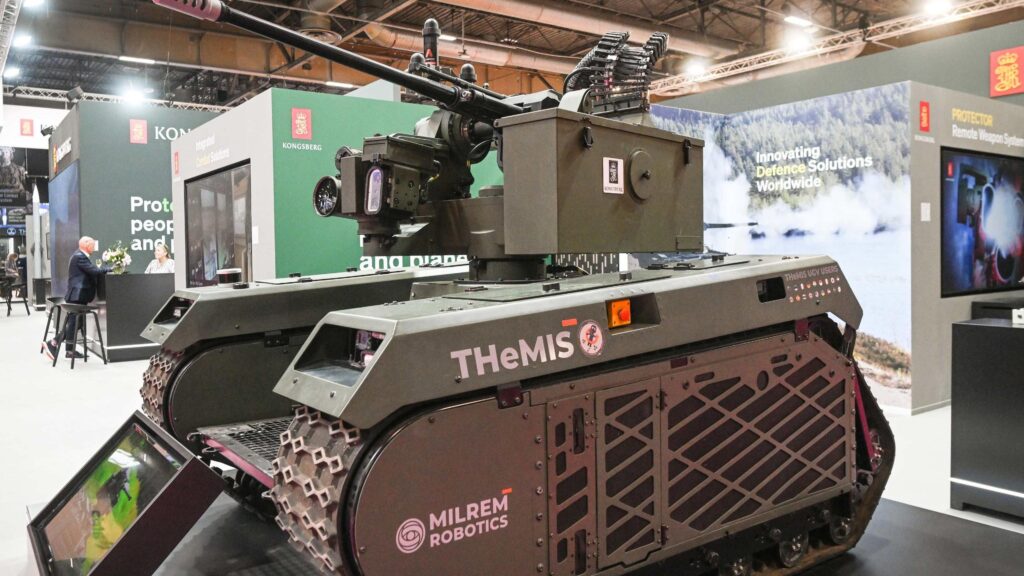 Unmanned ground vehicle built by Milrem Robotics on display at an exhibition in Paris