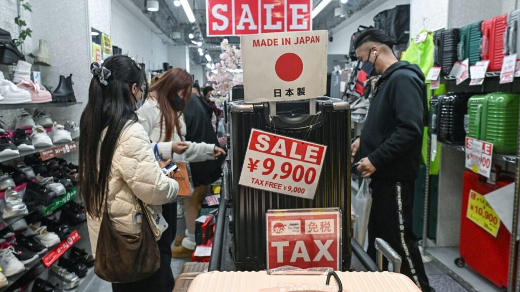 The interior of a retail store known for its dense 'jungle-like' displays and competitive pricing on items like luggage and shoes, seen with interior 'sale' signs, in central Osaka, Japan, on 1 April, 2026.