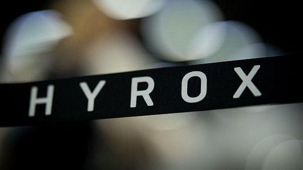 A stock image with a banner showing the name Hyrox over an out-of-focus background.