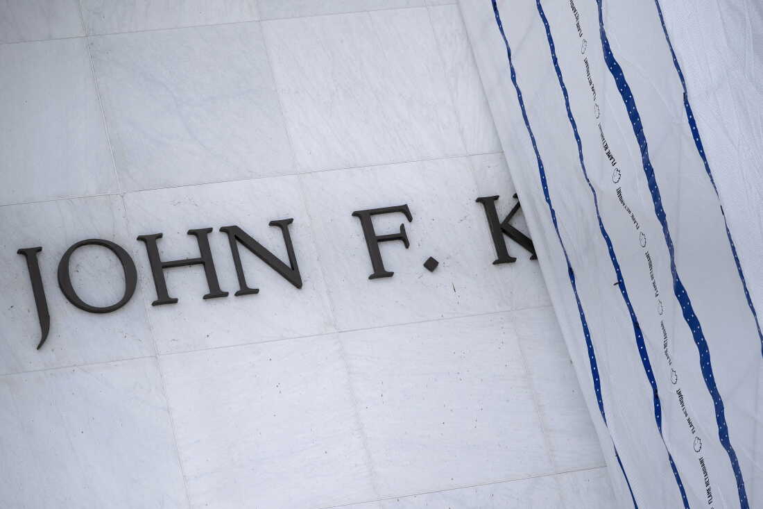 A tarp covers signage on the facade of the Kennedy Center in Washington, D.C,, on June 15, 2026, after a judge ordered the removal of President Donald Trump's name from the building.