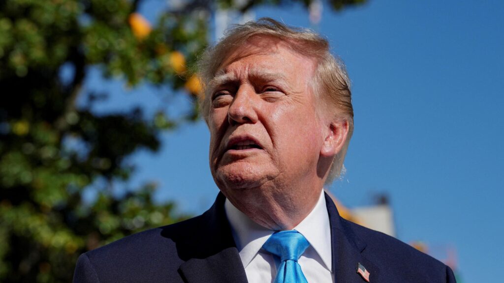 US President Donald Trump speaks with media before boarding Marine One as he travels to Grand Island, Nebraska, on the South Lawn of the White House in Washington.