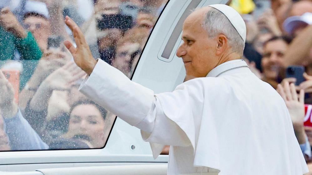 Pope Leo XIV greets the faithful during his weekly general audience, in Vatican City, 21 October 2026
