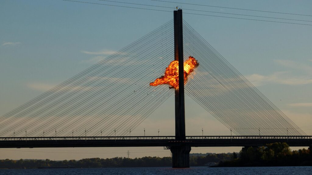 A Russian drone explodes after hitting cables of Kyiv's Pivdennyi bridge. Photo: 2 October 2026