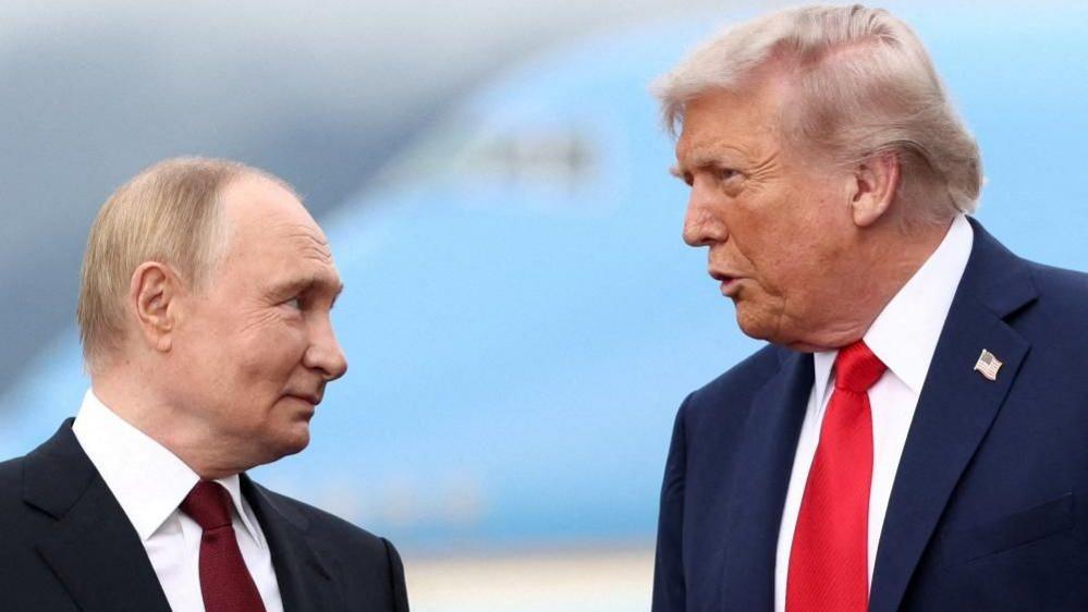 Trump and Putin speaking during a visit to Alaska