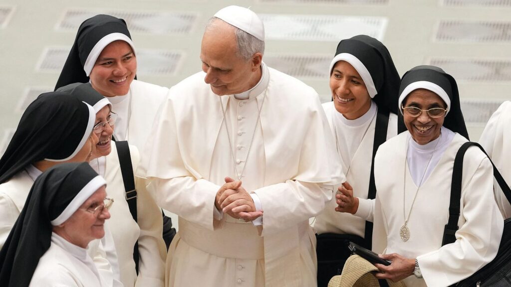 Pope Leo XIV greets religious sisters in the Paul VI Audience Hall at the Vatican